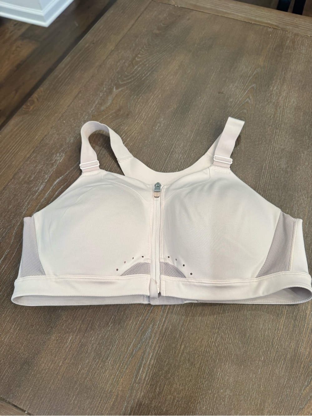 Nike Front-Zip Wireless Sports Bra in Pale Pink